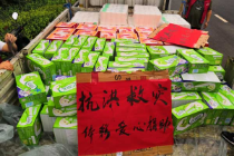 天灾无情体彩有爱 滨州体彩志愿者在行动